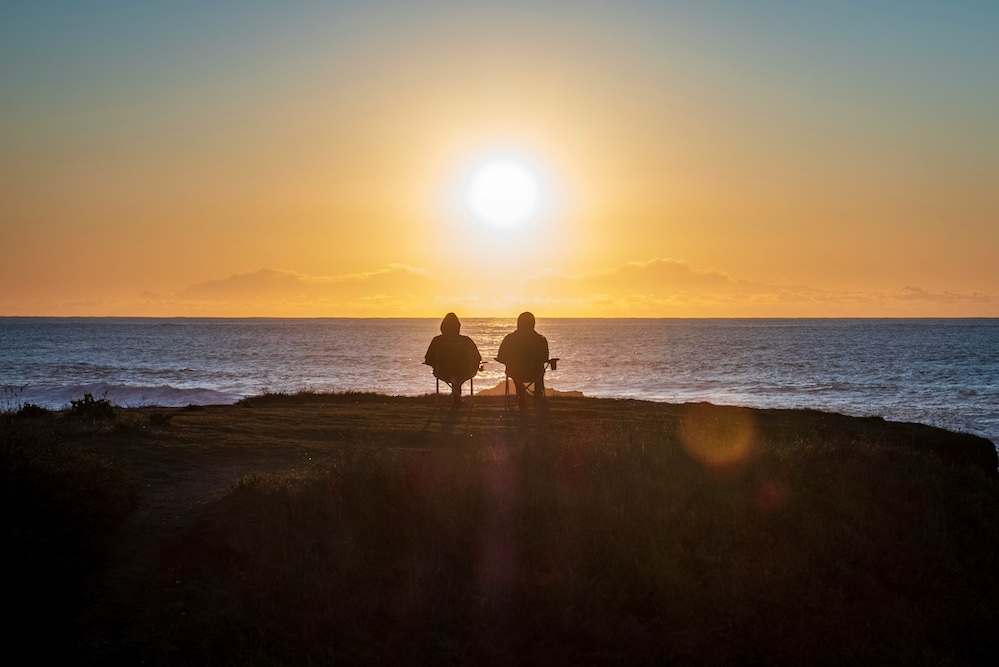 couple watching the sun set