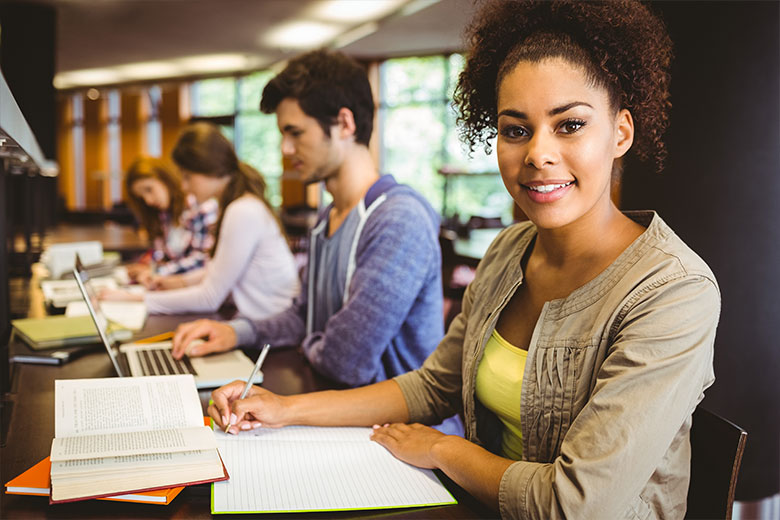 college students studying in library